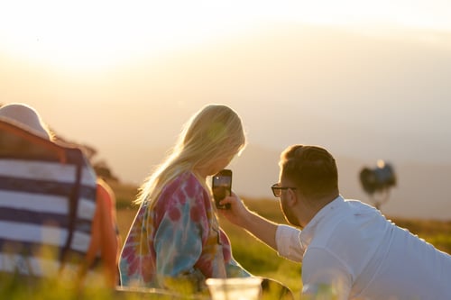 summit sunset at Mt Buller during green season picnic couple